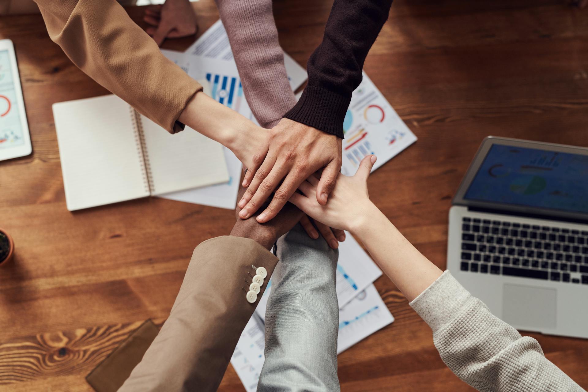 Senior team collaborating — local operators across LatAm